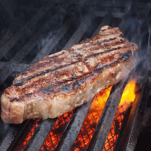Rib-Eye-Steaks mit Portwein-Zwiebeln und Grillpaprika